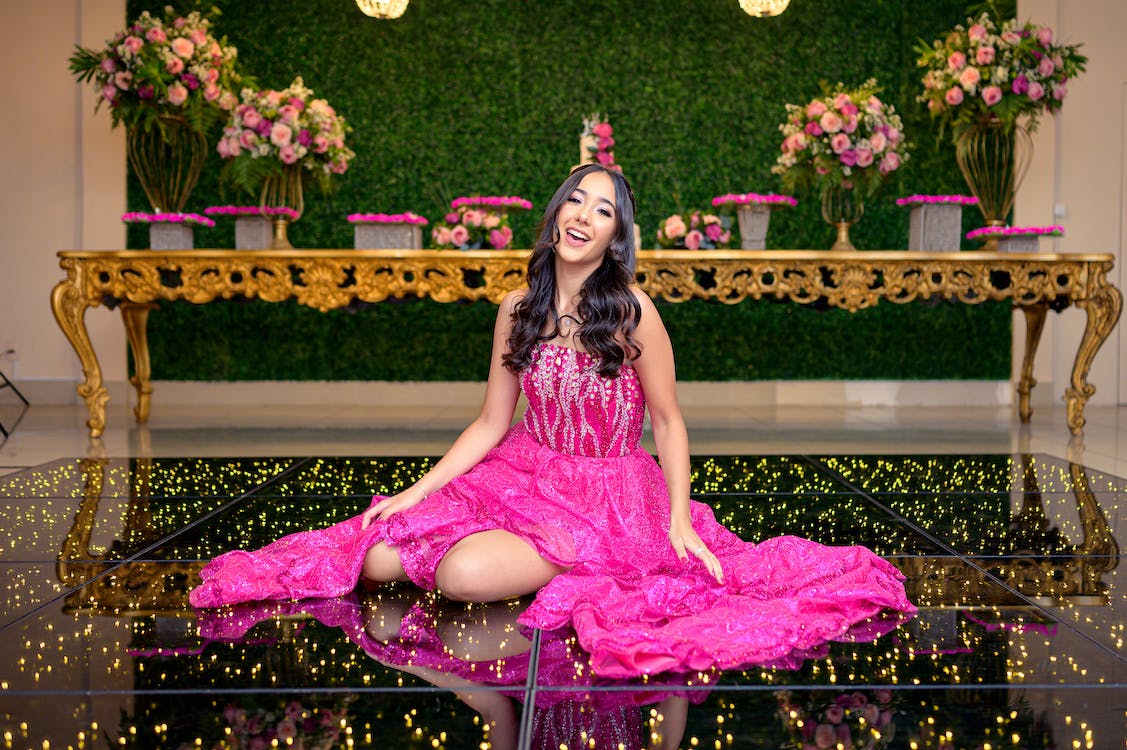 Clothing Shop 9 Clothing Shop -Clothing Shop free photo of model in a pink evening dress sitting on the floor of a banquet hall